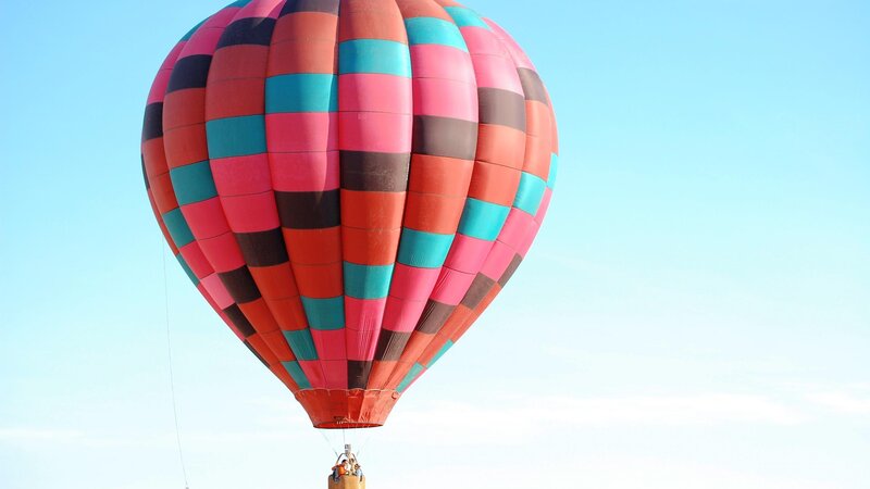 Colorful hot air balloon in flight