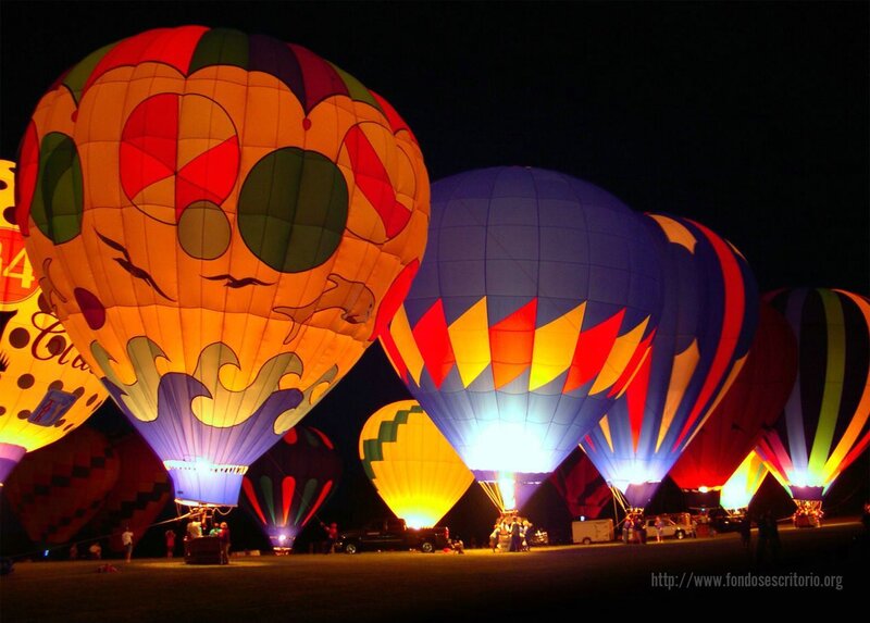 Colorful hot air balloons at night