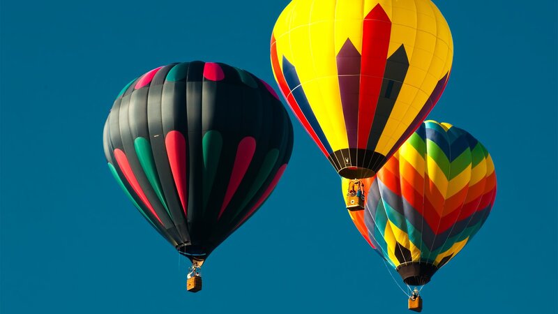 Colorful hot air balloons in flight