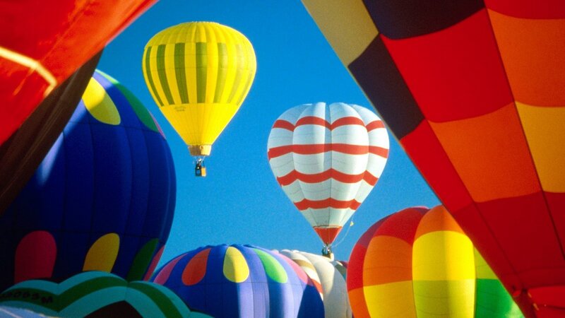 Colorful hot air balloons in sky