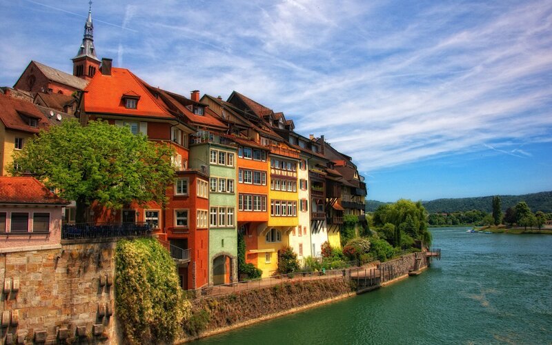 Colorful houses along a river
