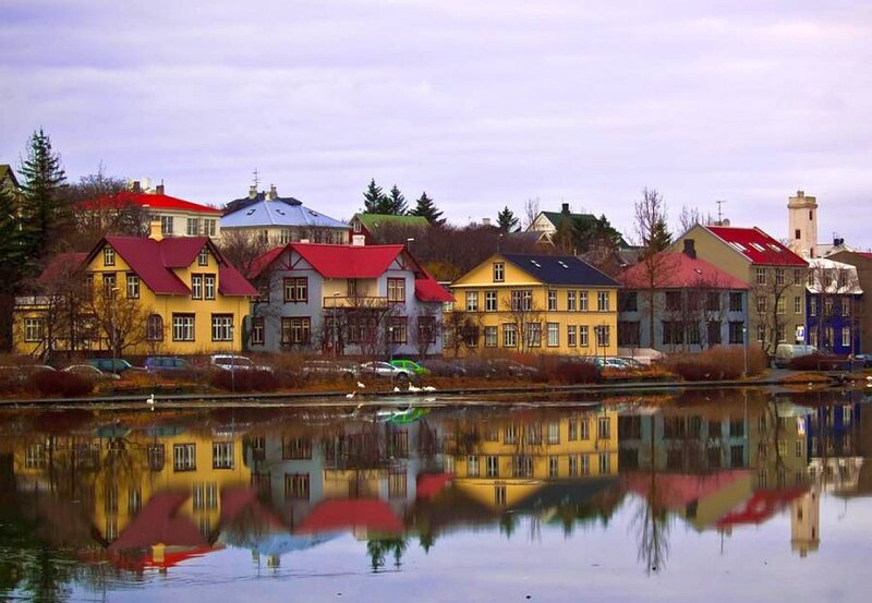 Colorful houses by a lake