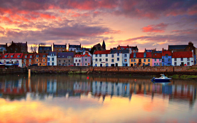 Colorful Houses by Water — Orange