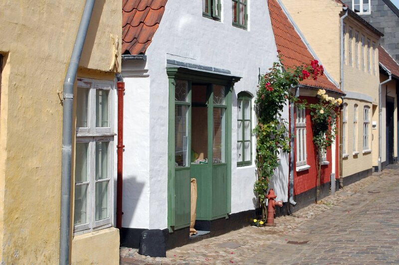 Colorful houses in a cobblestone alley