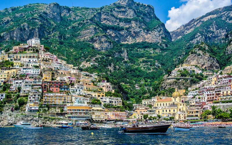 Colorful Houses on Cliff — Blue, Serene, Afternoon, Photograph, Mountain