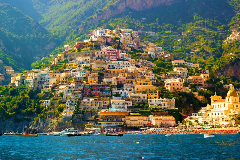 Colorful Houses on Cliff — Blue, Vibrant