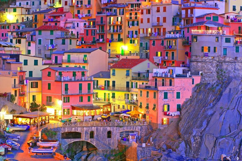 Colorful Houses on Cliff — Yellow, Vibrant