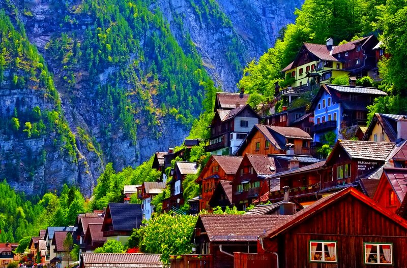 Colorful Houses on Hillside — Green, Serene