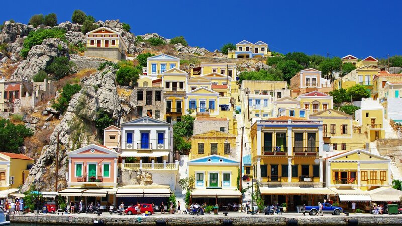 Colorful Houses on Hillside — Yellow, Vibrant, Afternoon