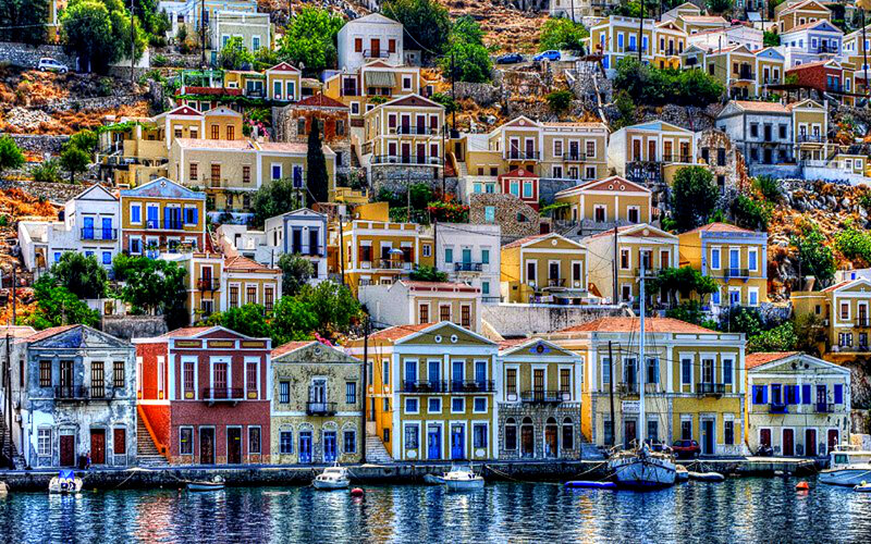 Colorful Houses on Hillside — Yellow, Vibrant