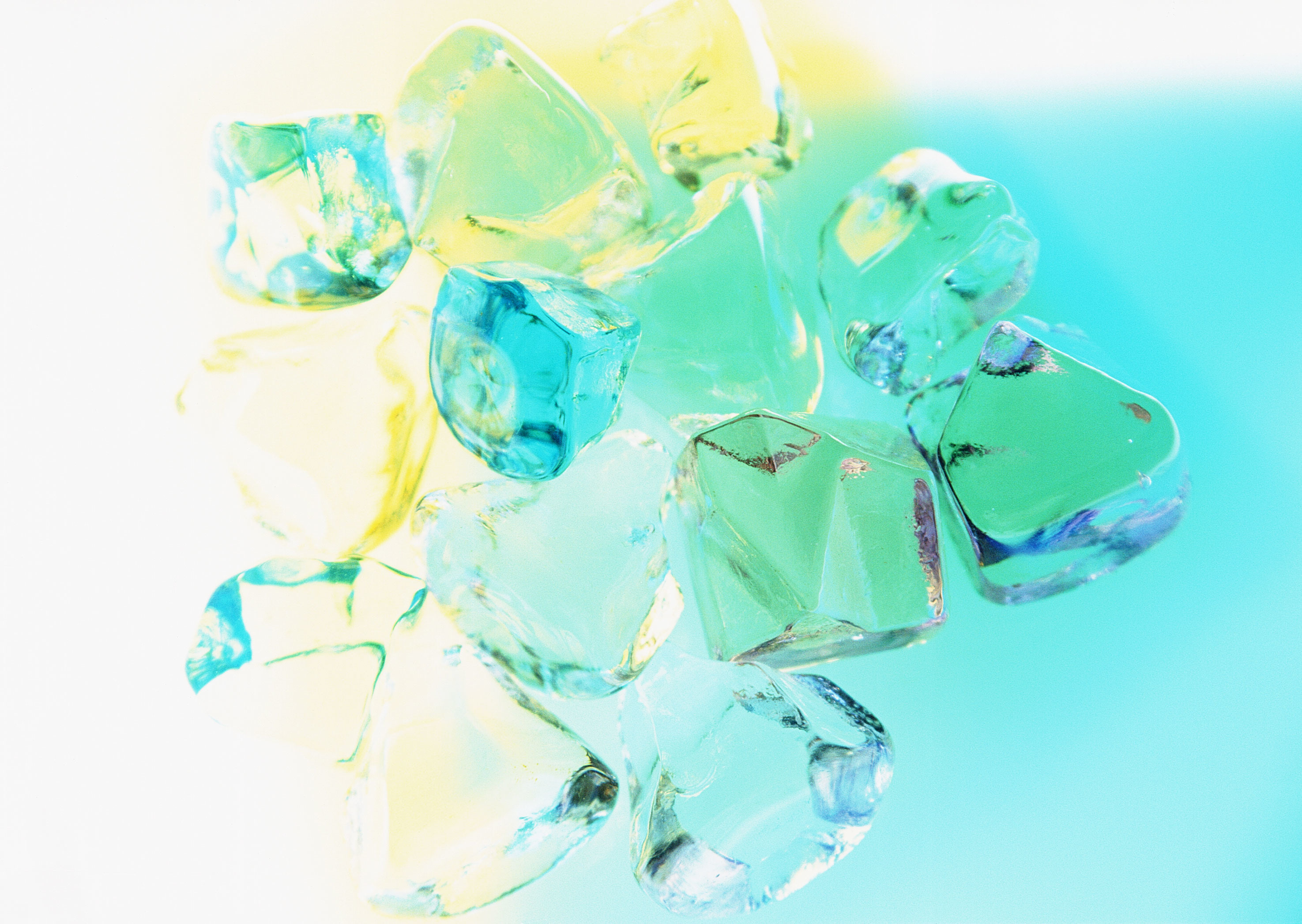 Colorful ice cubes on gradient