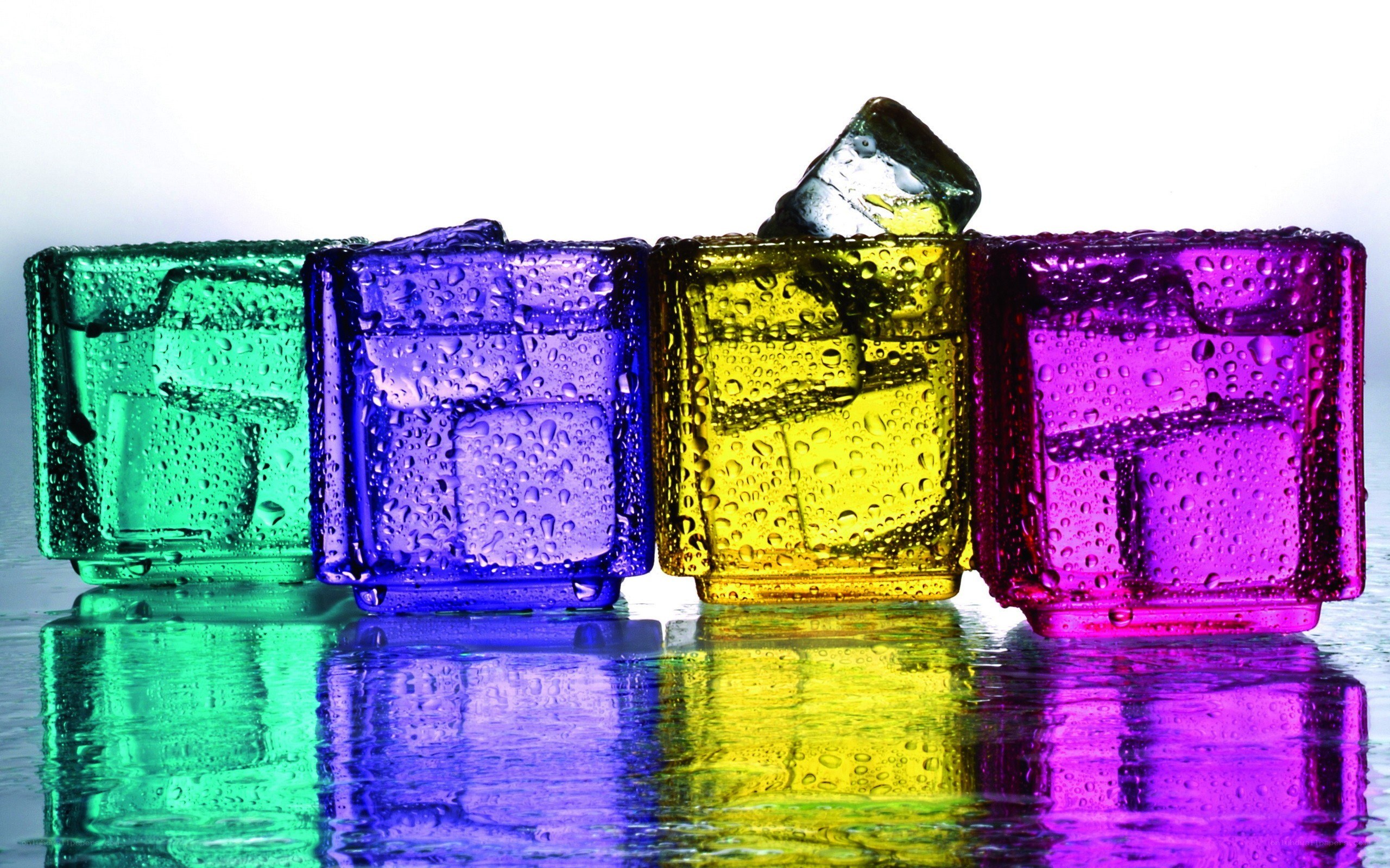 Colorful ice cubes with condensation
