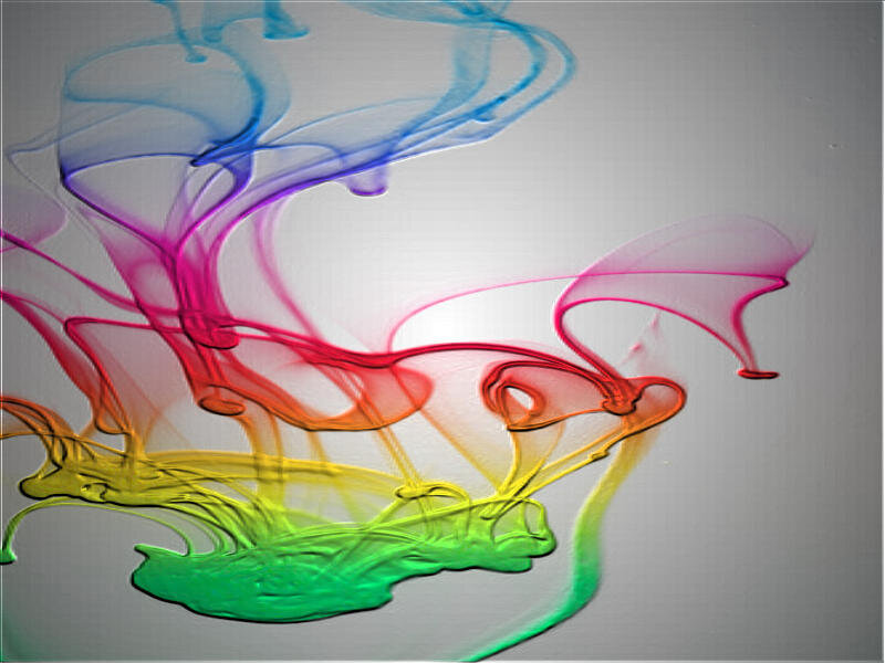 Colorful ink swirls in water