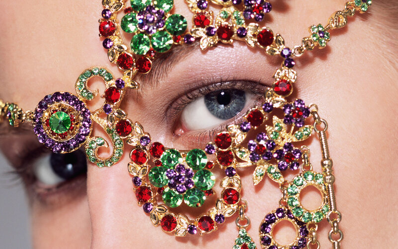 colorful jewelry on face