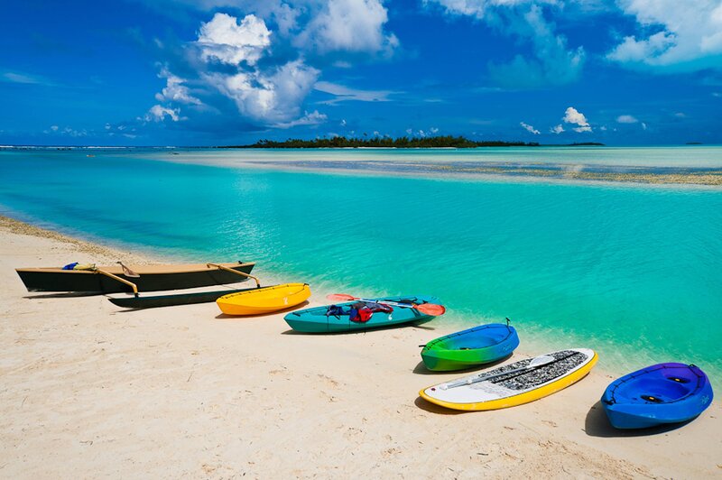 Colorful Kayaks on Beach — Blue, Serene