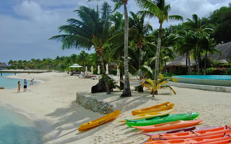 Colorful Kayaks on Beach