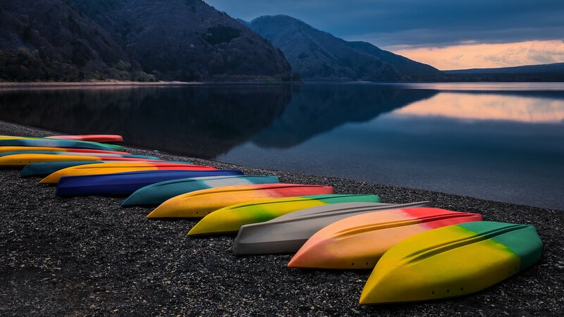 Colorful Kayaks on Shore