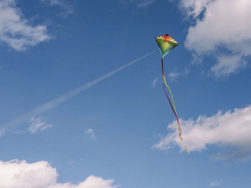 Colorful Kite Flying — Blue, Serene, Afternoon