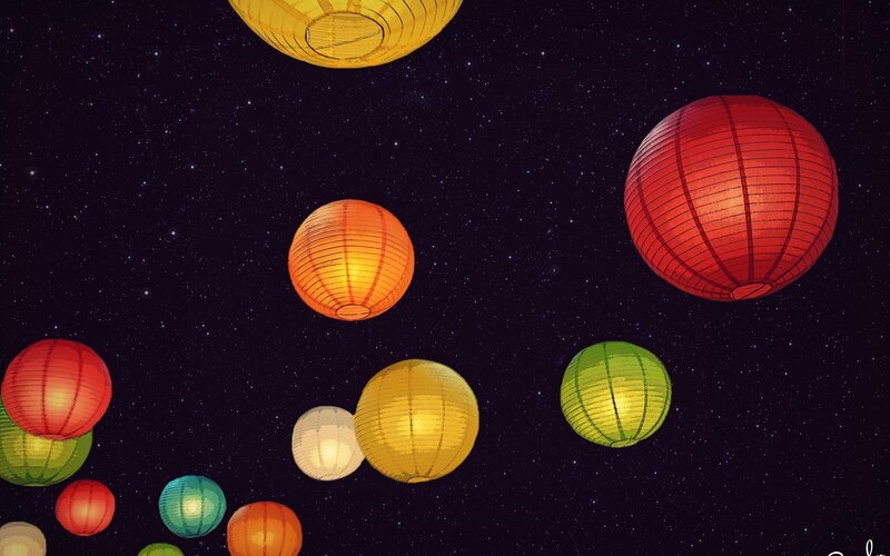 Colorful lanterns in the night sky