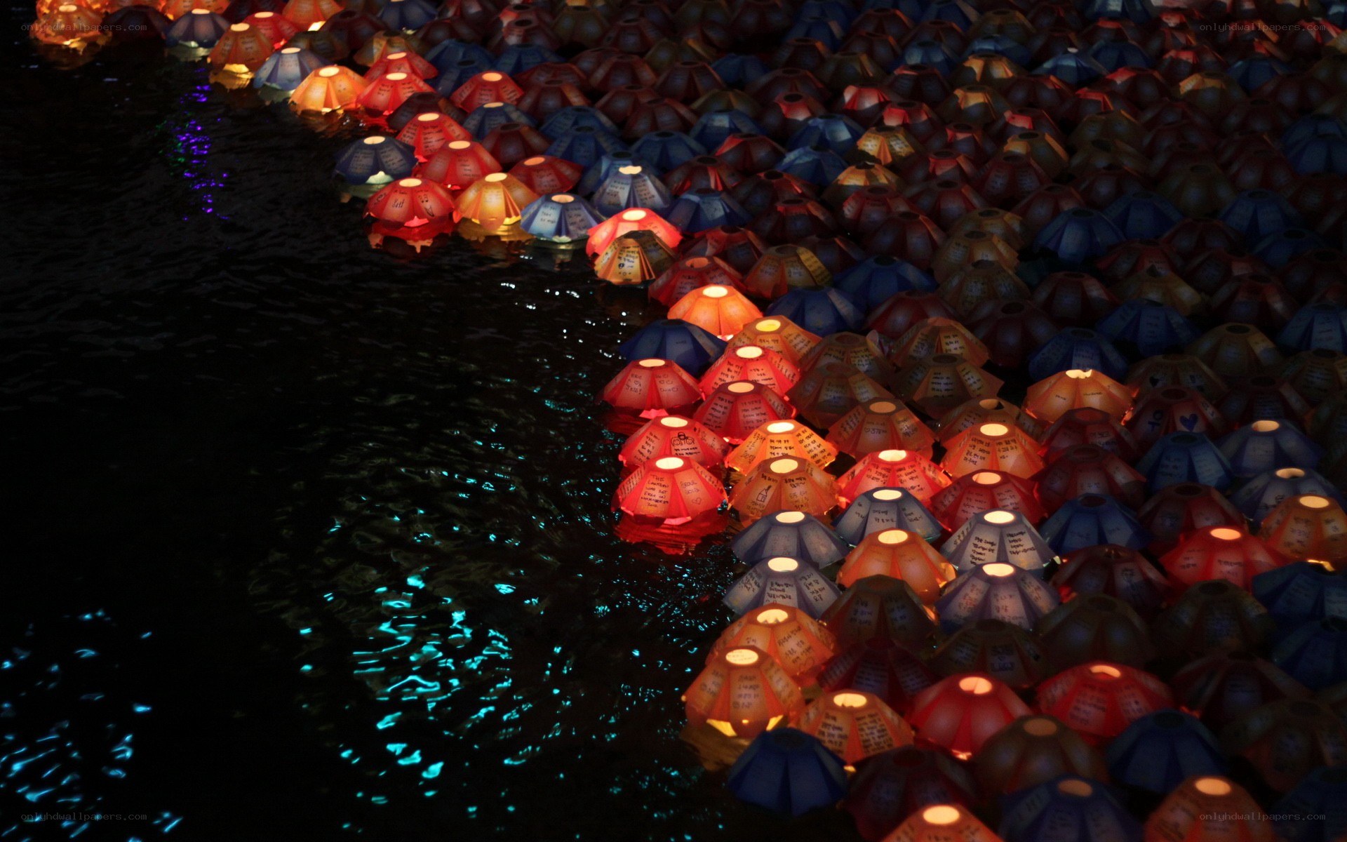 Colorful lanterns on water