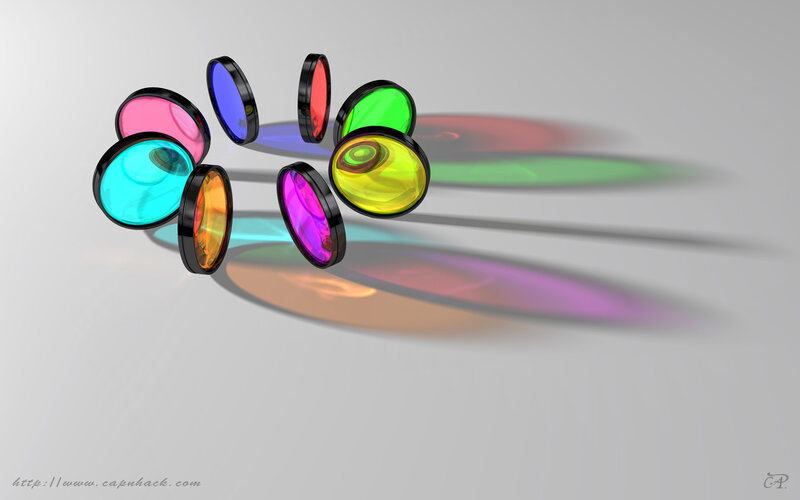 Colorful lens filters on white surface