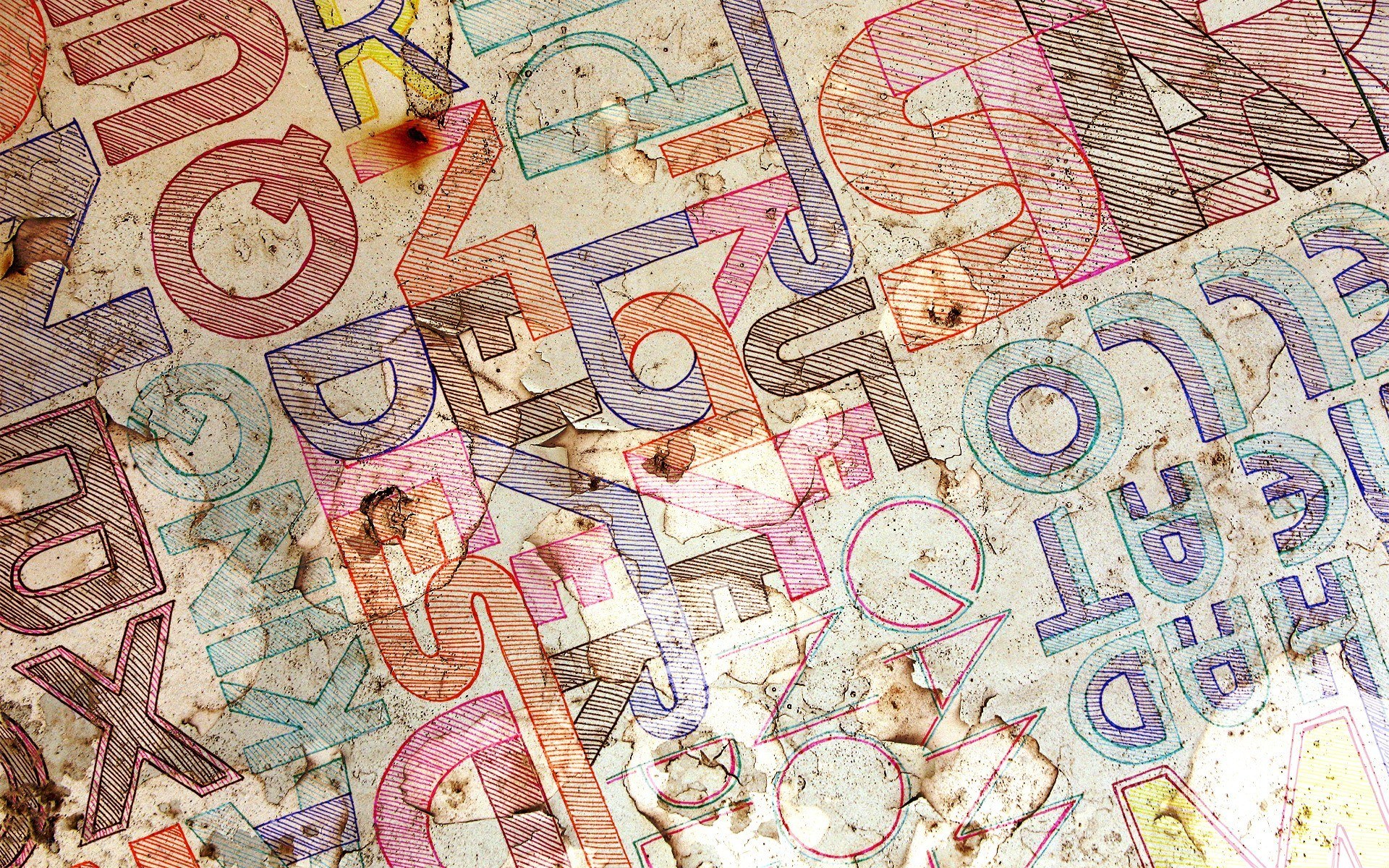 colorful letters on textured surface