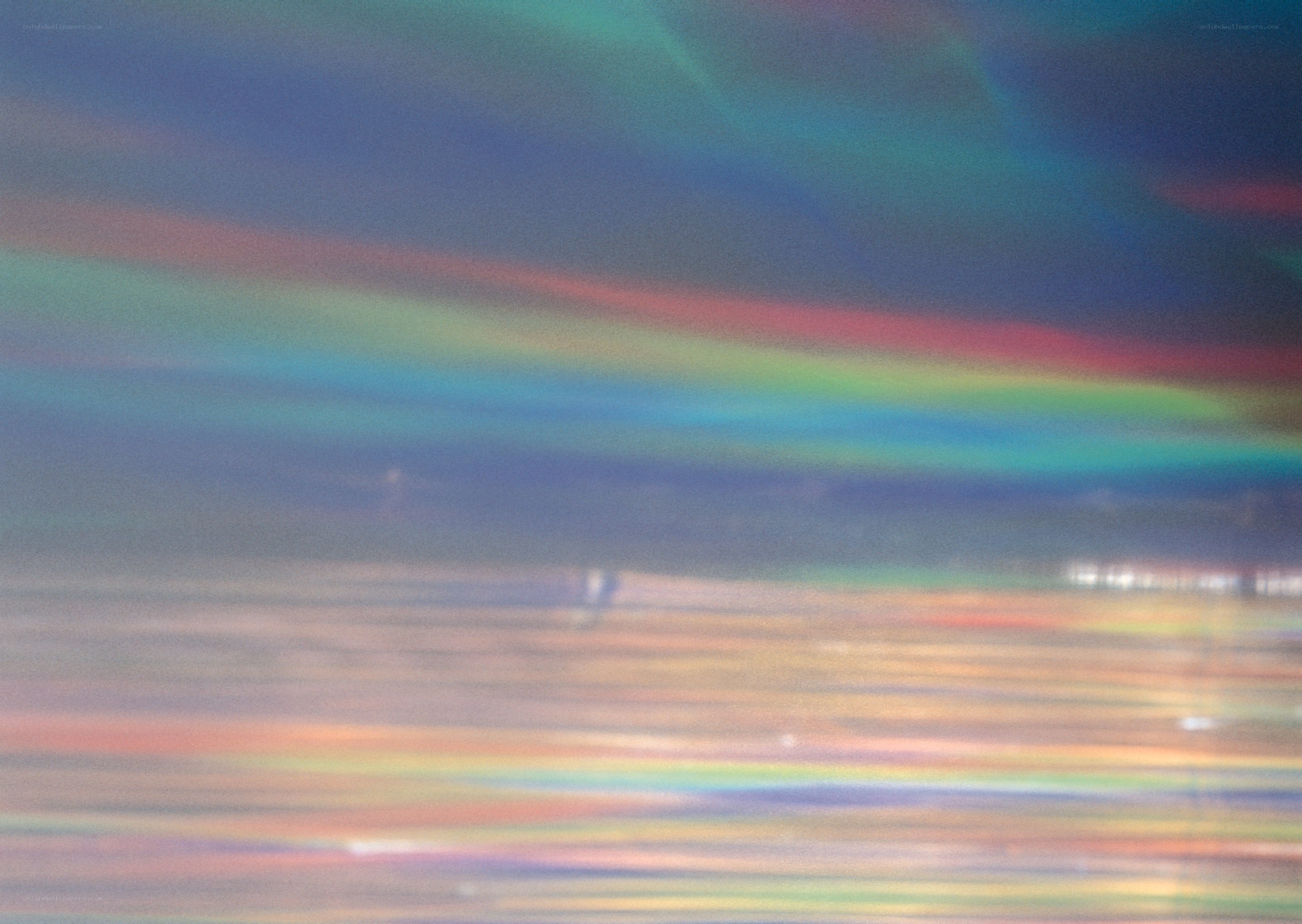 Colorful light streaks in sky