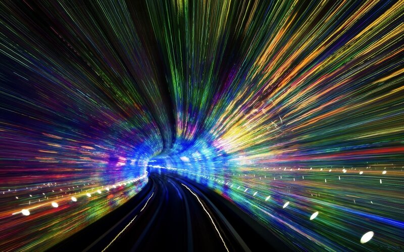 colorful light streaks in tunnel