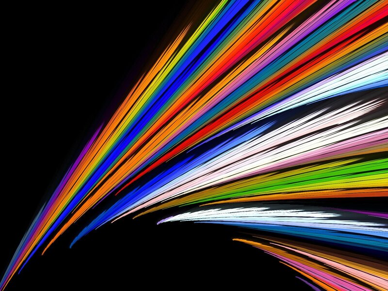 Colorful light streaks on black