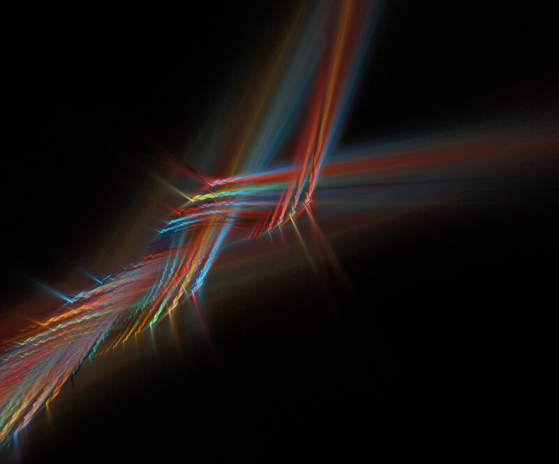 Colorful light streaks on black