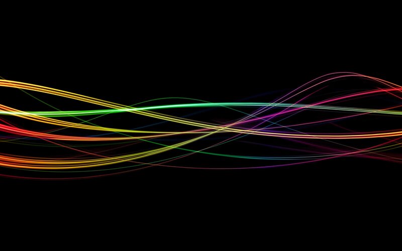 Colorful light streaks on black