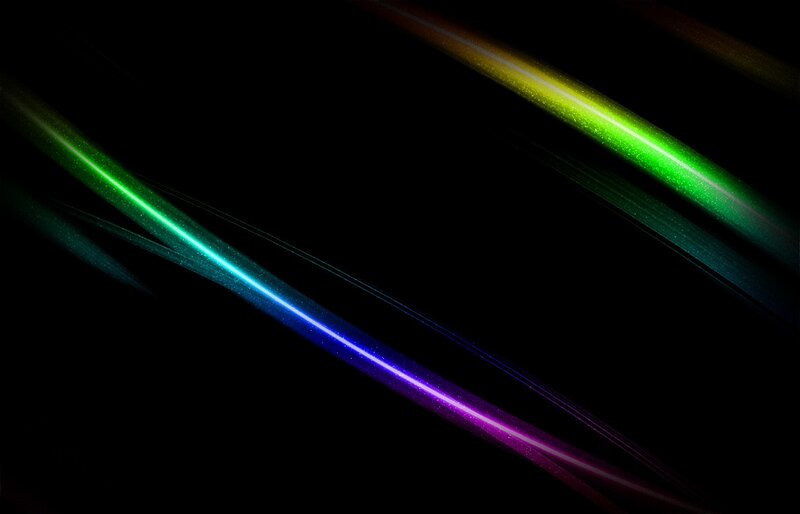 colorful light streaks on black