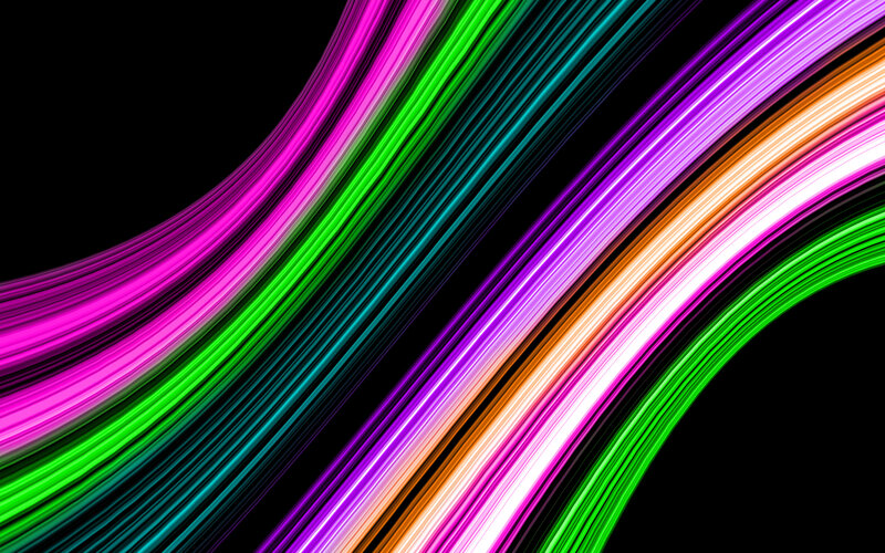 Colorful light streaks on black