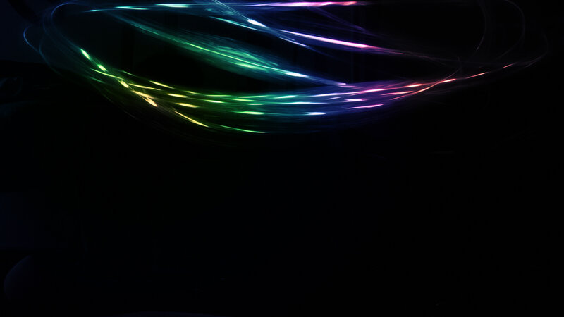 colorful light trails in darkness