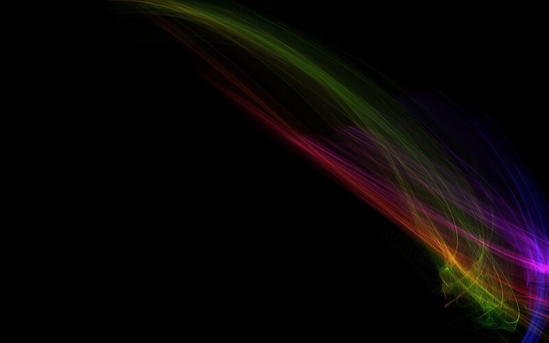 colorful light trails on black