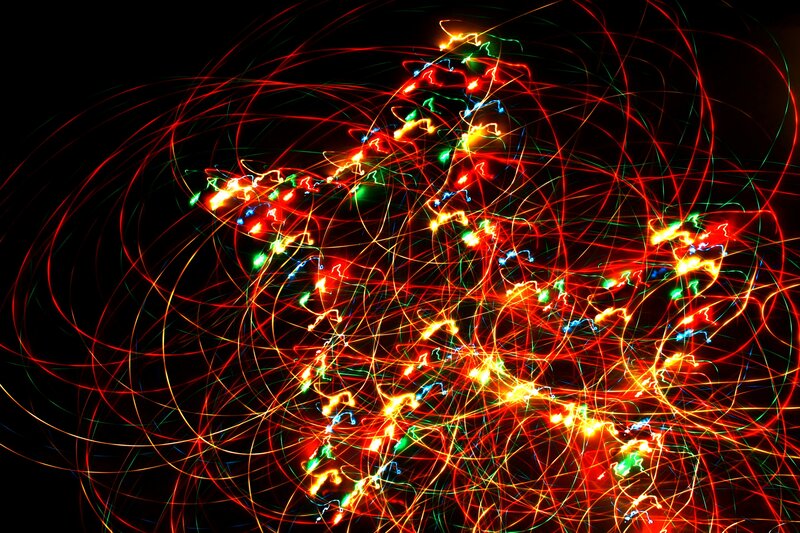 colorful light trails on black
