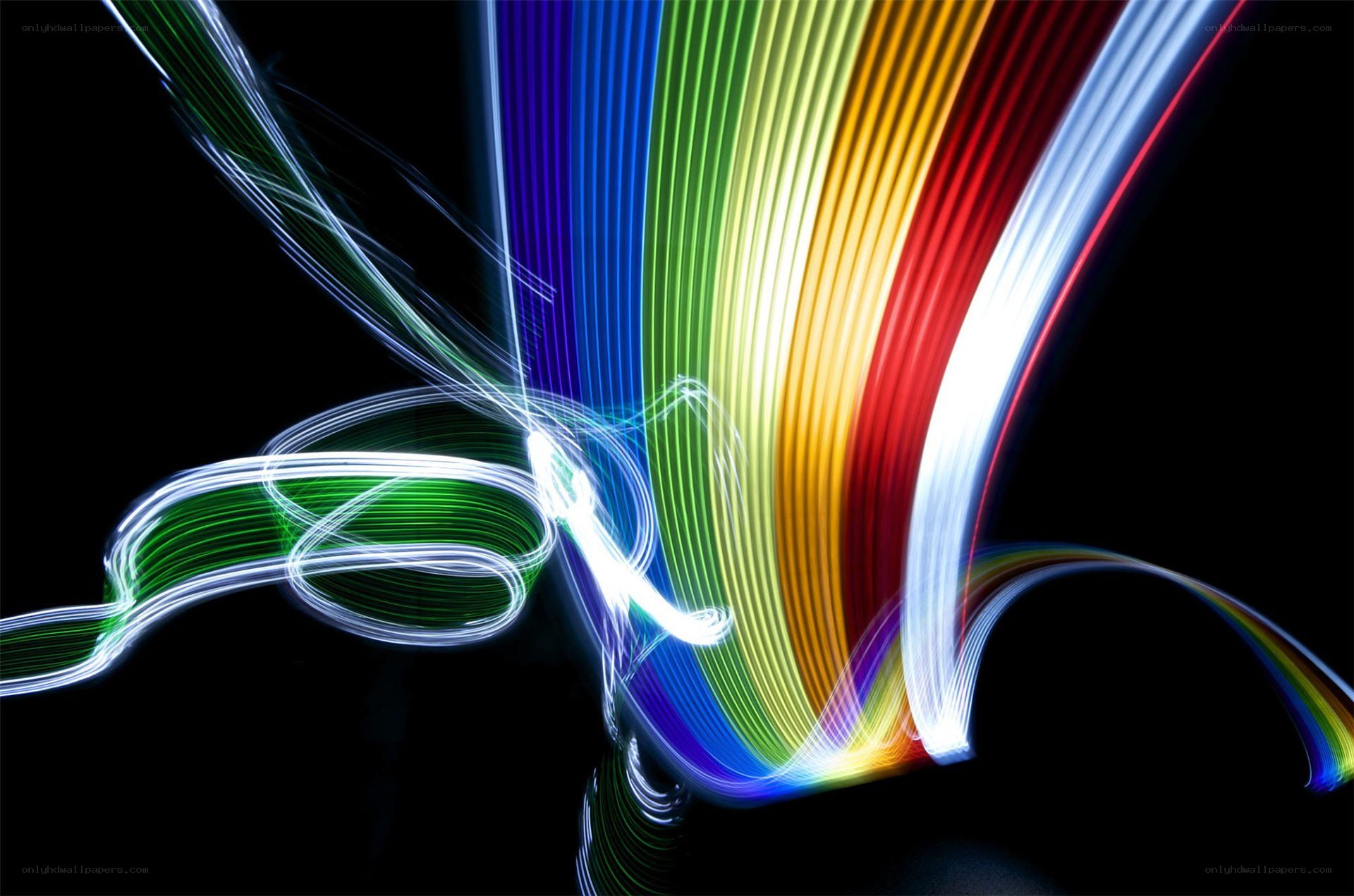 Colorful light trails on black