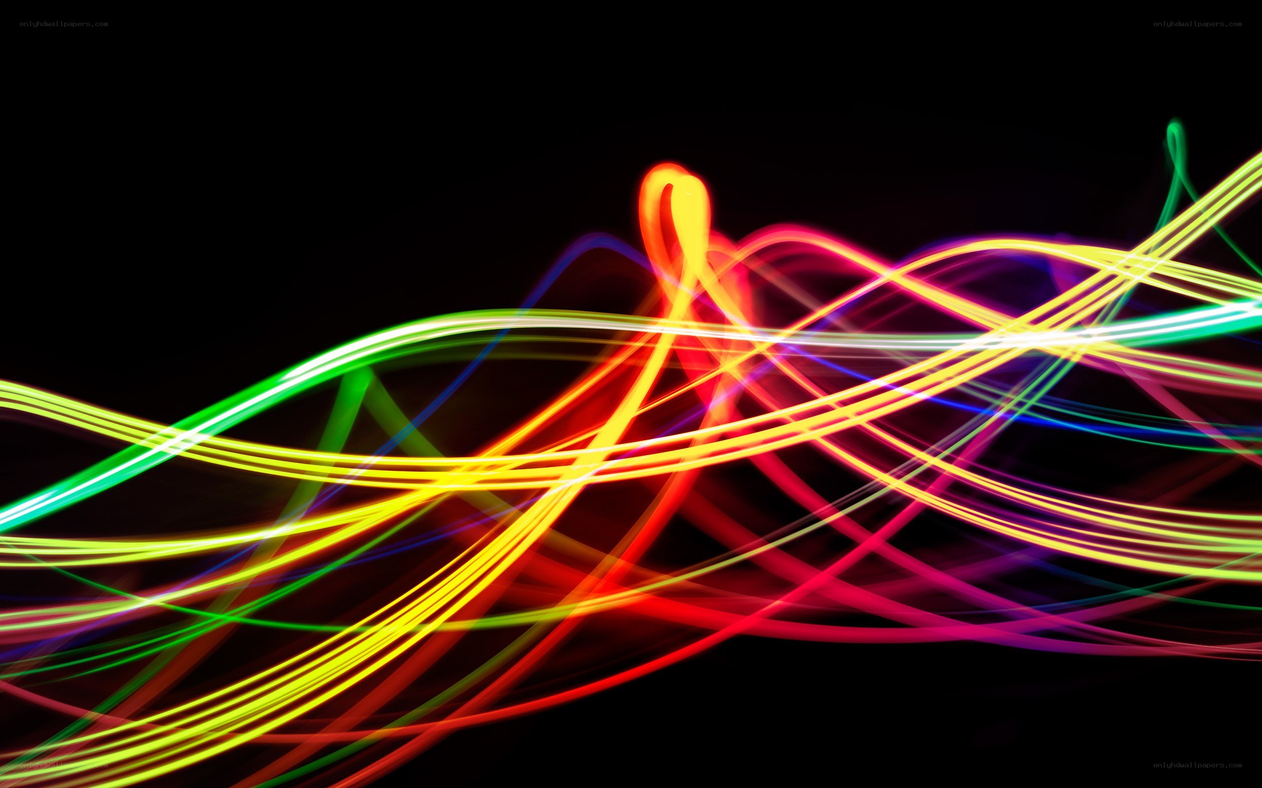 Colorful light trails on black