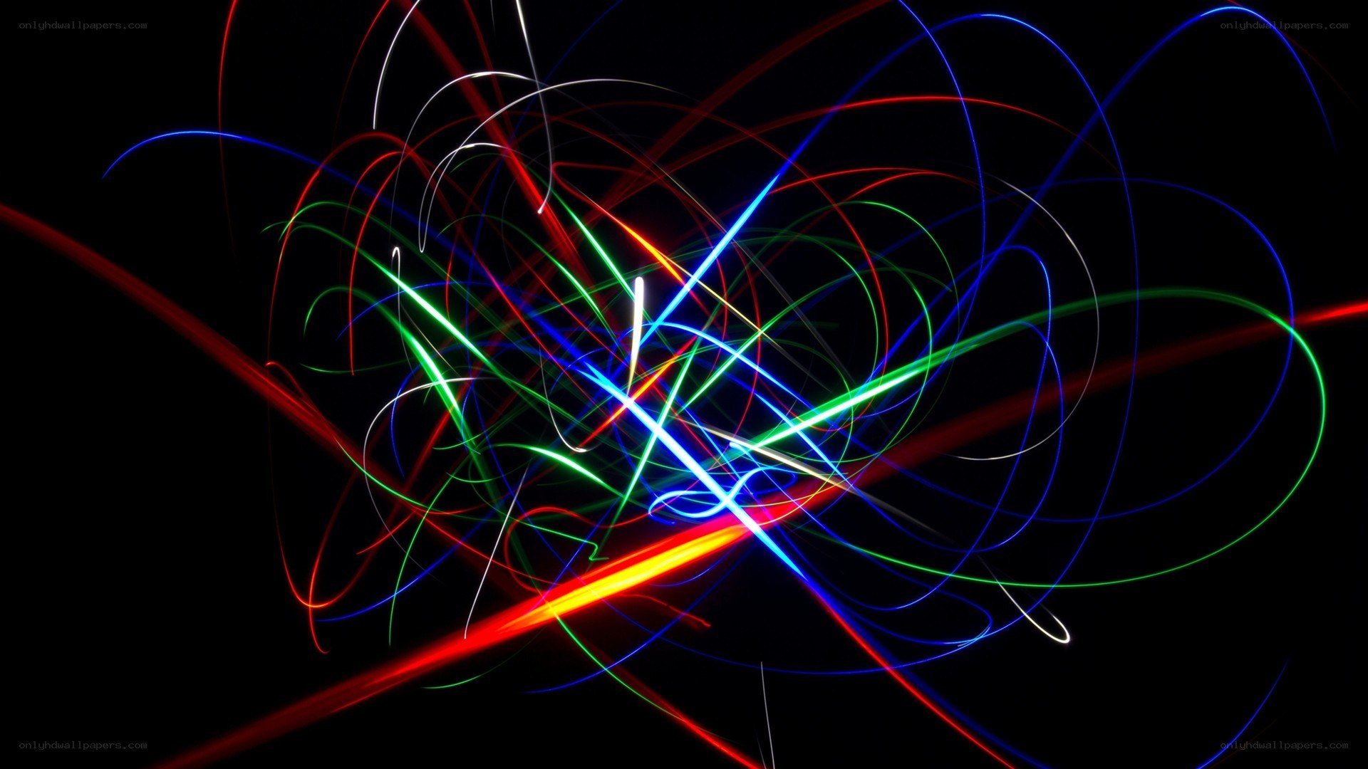 Colorful light trails on black