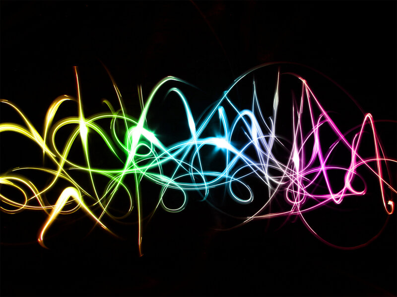 Colorful light trails on black