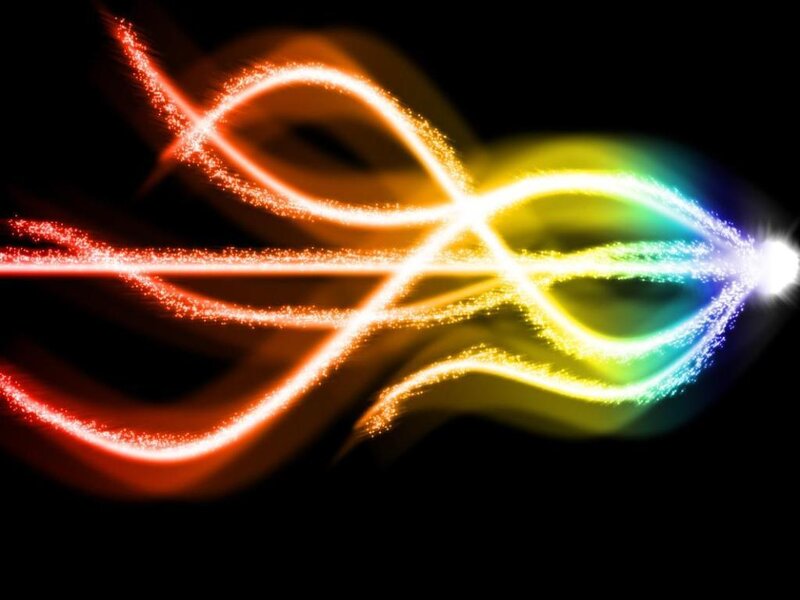 colorful light trails on black