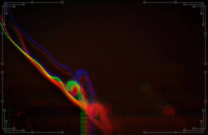 colorful light trails on dark background