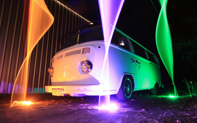 colorful light trails on van