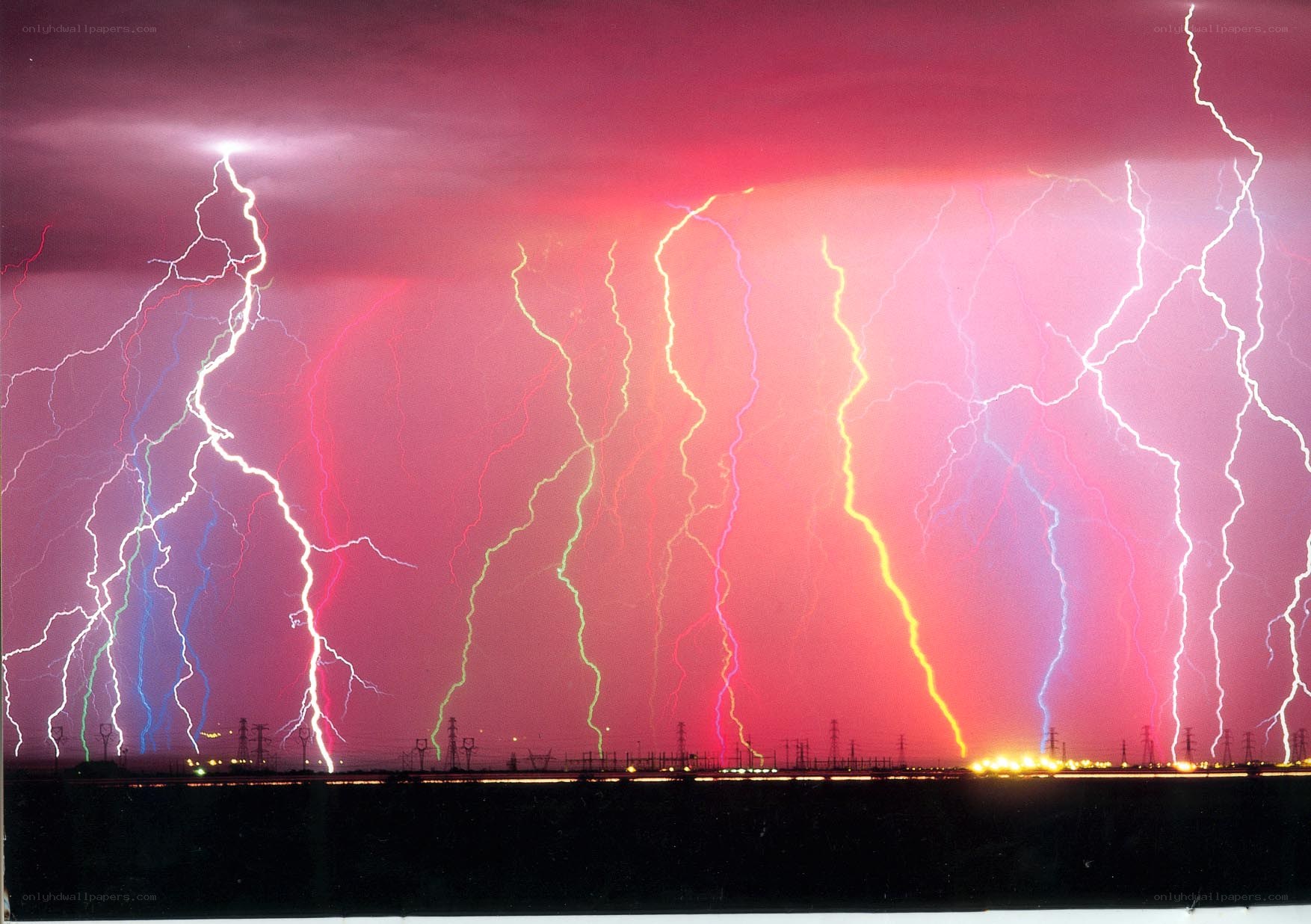 Colorful lightning storm at night