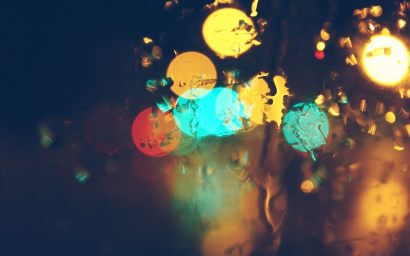 colorful lights through raindrops