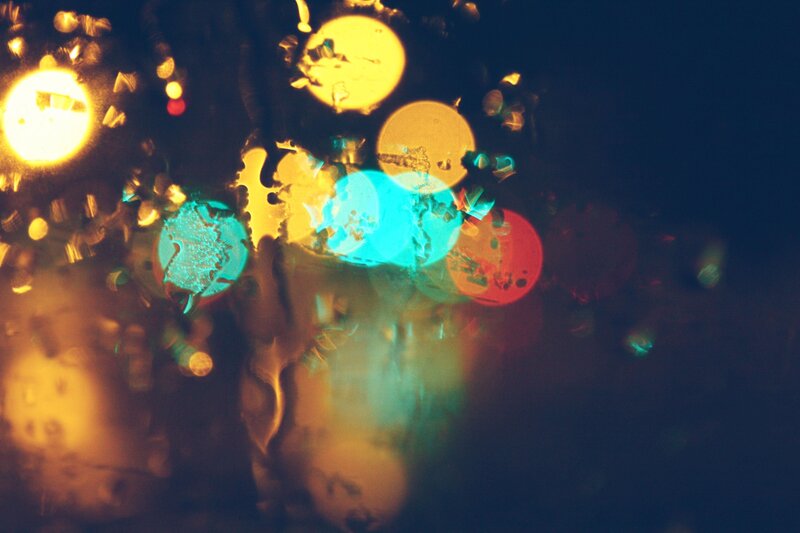colorful lights through raindrops