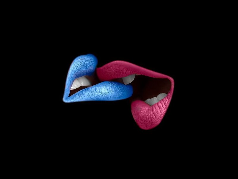 colorful lips on black background