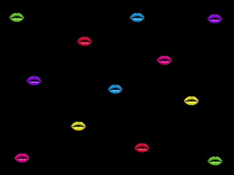 colorful lips on black background