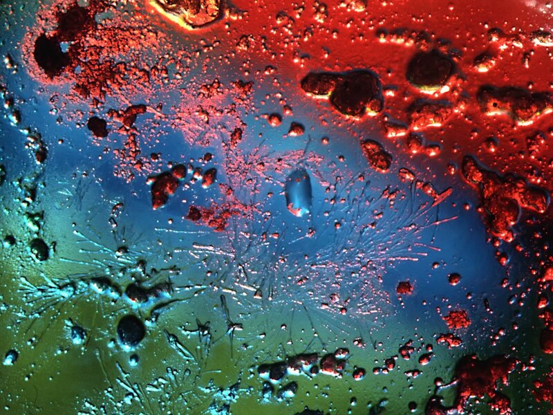 Colorful liquid patterns on glass