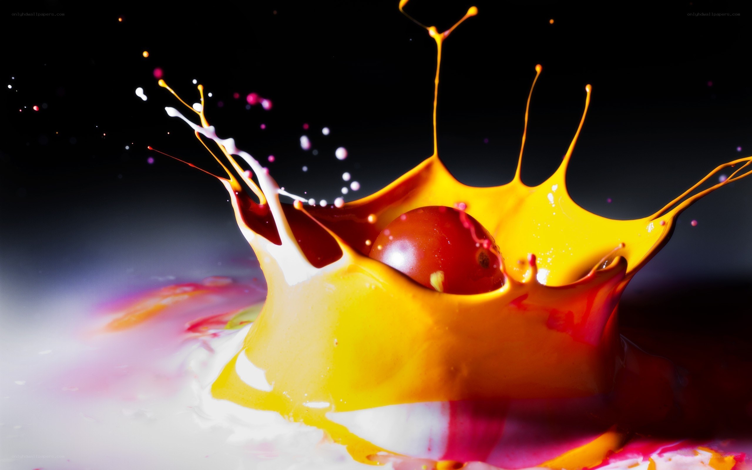 colorful liquid splash with fruit